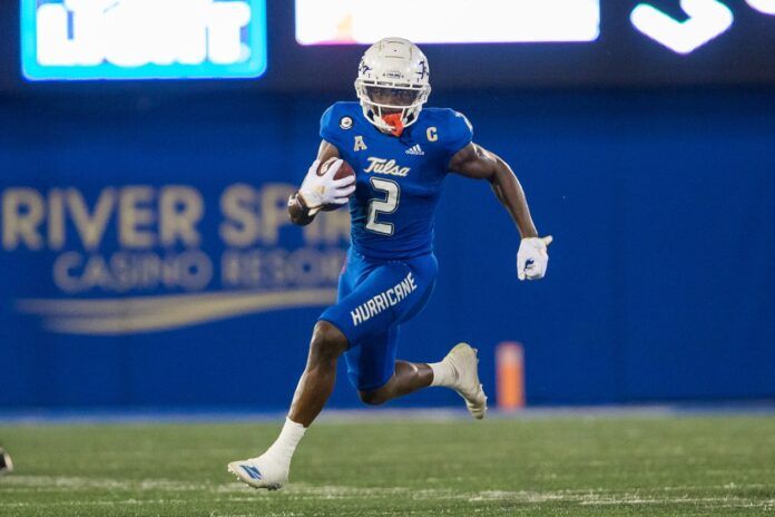 Keylon Stokes runs after a reception during the third quarter against the Cincinnati Bearcats.