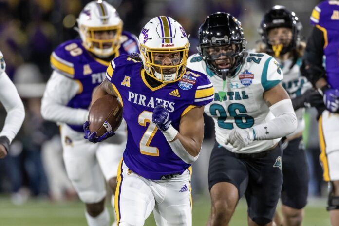 Keaton Mitchell runs for a gain against the Coastal Carolina Chanticleers.