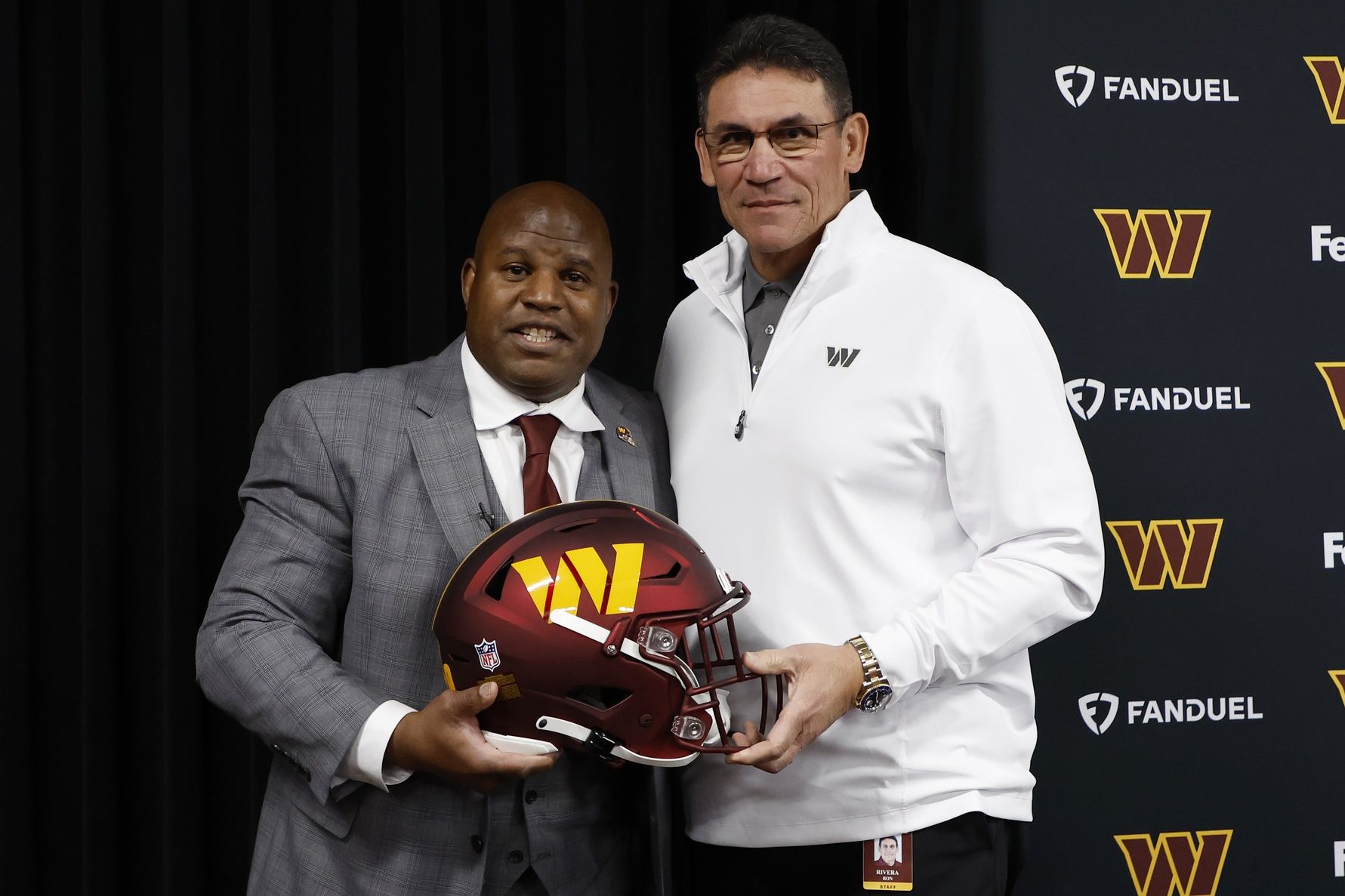 Eric Bieniemy poses with Washington Commanders head coach Ron Rivera.