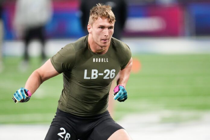 Arkansas linebacker Drew Sanders performs drills at the NFL Scouting Combine.