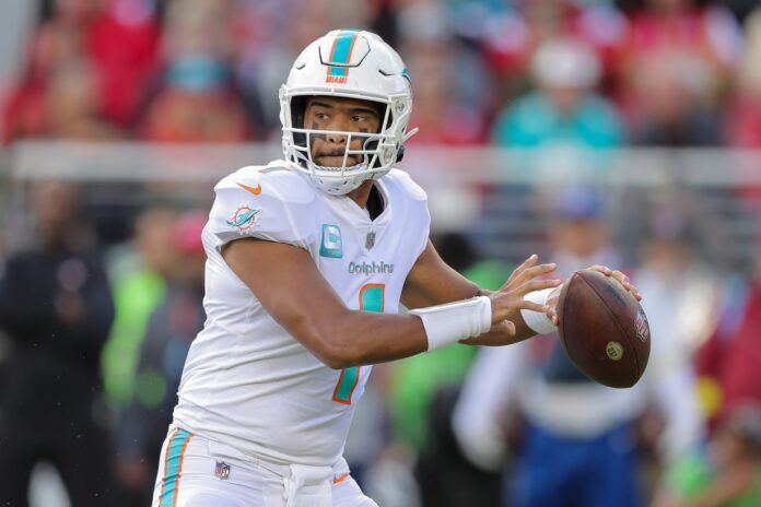 Miami Dolphins QB Tua Tagovailoa (1) winds up a throw against the 49ers.