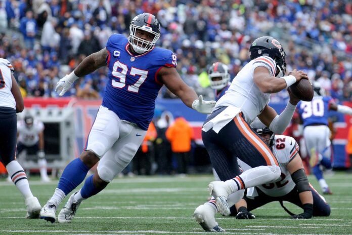 New York Giants DL Dexter Lawrence (97) pressures Bears QB Justin Fields (1).