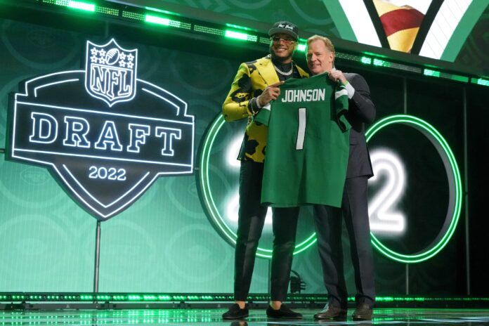 Jermaine Johnson with NFL commissioner Roger Goodell after being selected as the twenty-sixth overall pick.