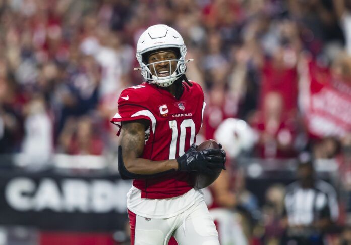 DeAndre Hopkins celebrates after scoring a touchdown against the Houston Texans.