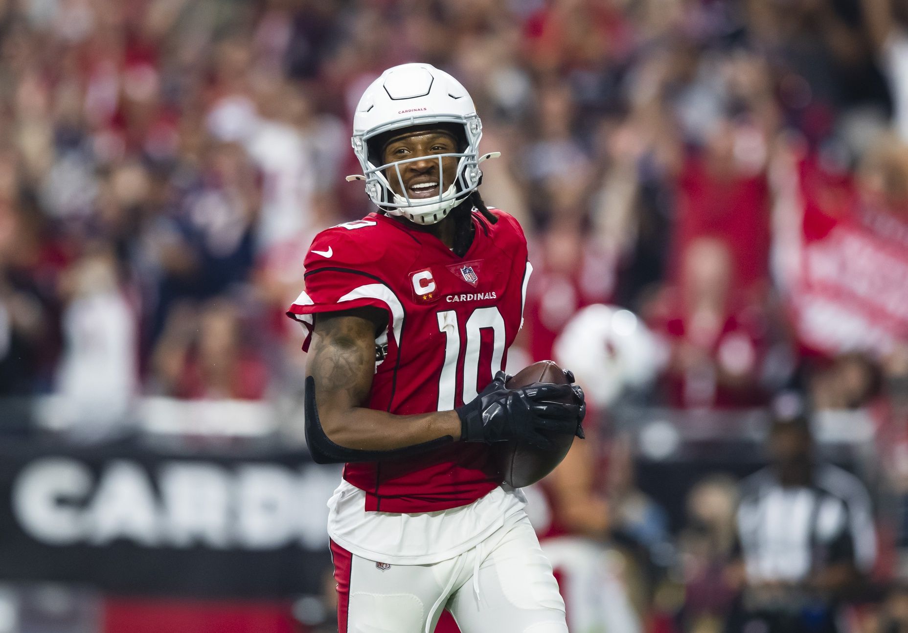 DeAndre Hopkins celebrates after scoring a touchdown against the Houston Texans.