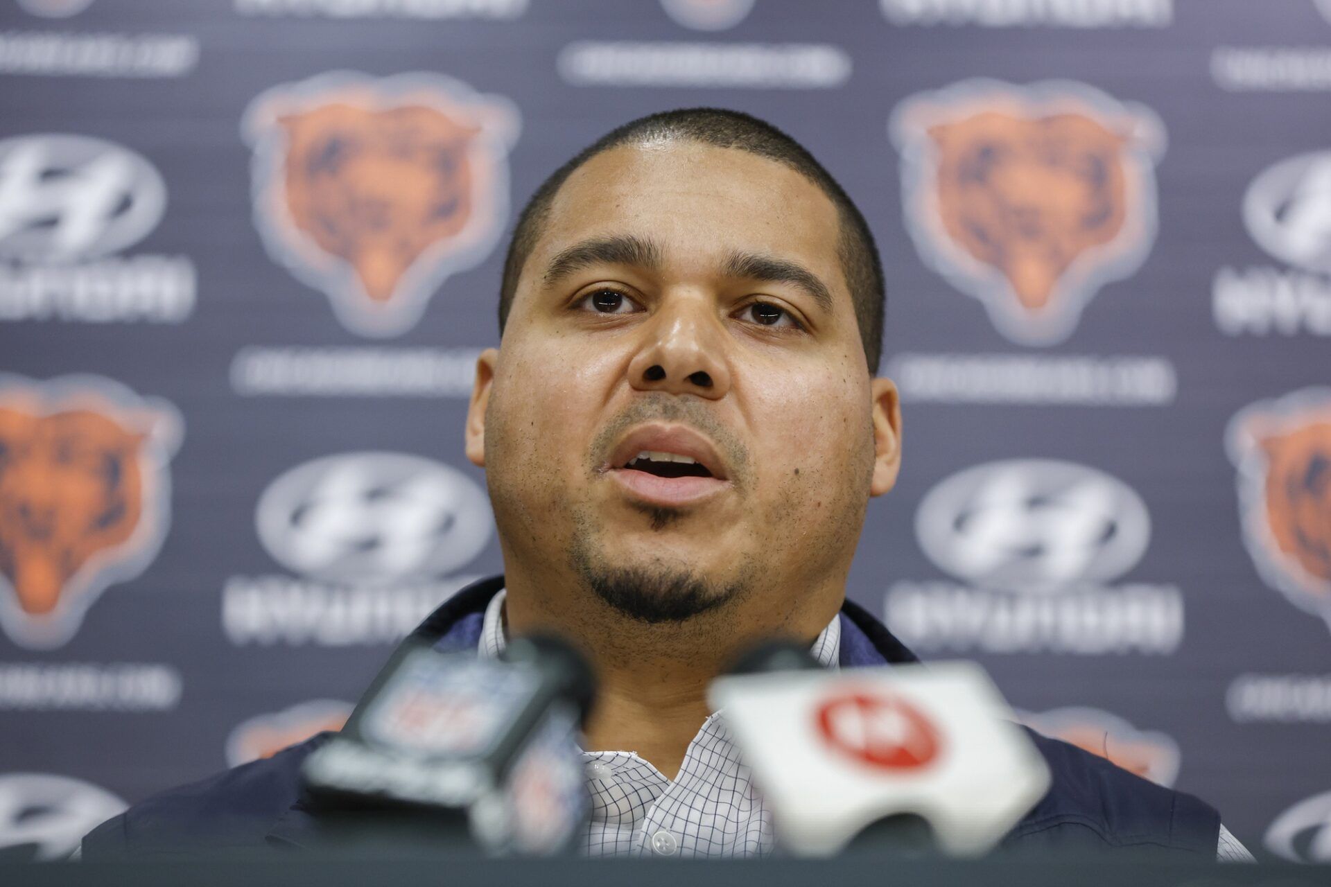 Ryan Poles speaks during a press conference at Halas Hall.