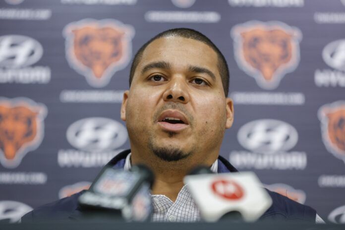 Ryan Poles speaks during a press conference at Halas Hall.