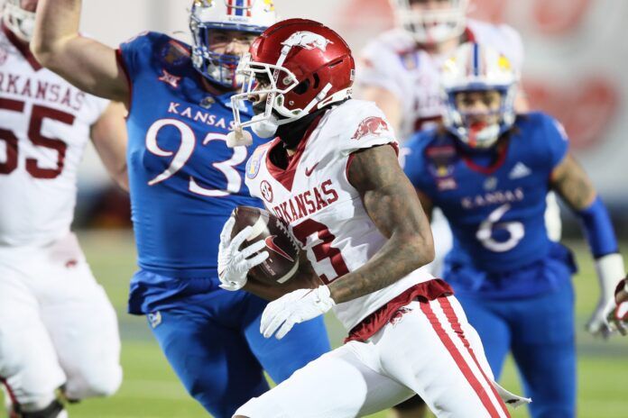 Matt Landers runs after a catch during the first overtime against the Kansas Jayhawks.