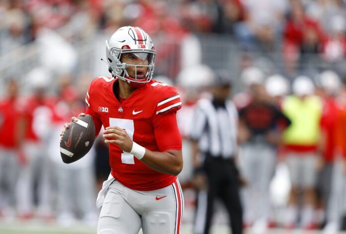 Ohio State Buckeyes quarterback C.J. Stroud (7) looks to throw during the first quarter against the Rutgers Scarlet Knights at Ohio Stadium.