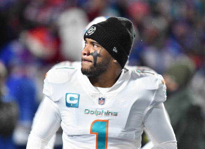 Miami Dolphins QB Tua Tagovailoa (1) enters the field against Buffalo.