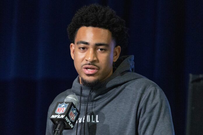 Alabama quarterback Bryce Young speaks to the press at the NFL Combine.