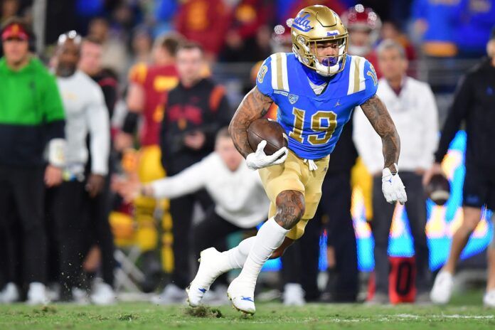 UCLA Bruins wide receiver Kazmeir Allen (19) runs the ball against USC.