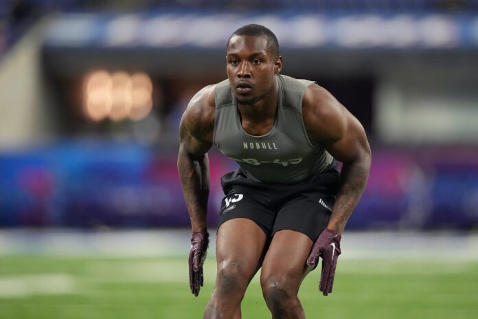 Virginia Tech safety Chamarri Conner participates in drills at Lucas Oil Stadium.