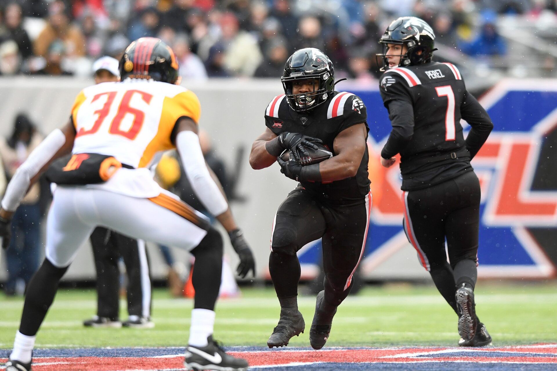 Darius Victor rushes against the Los Angeles Wildcats during an XFL game.