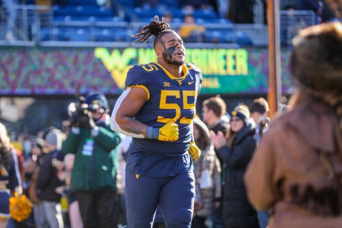 Dante Stills is honored during Senior Day before the game against the Kansas State Wildcats.