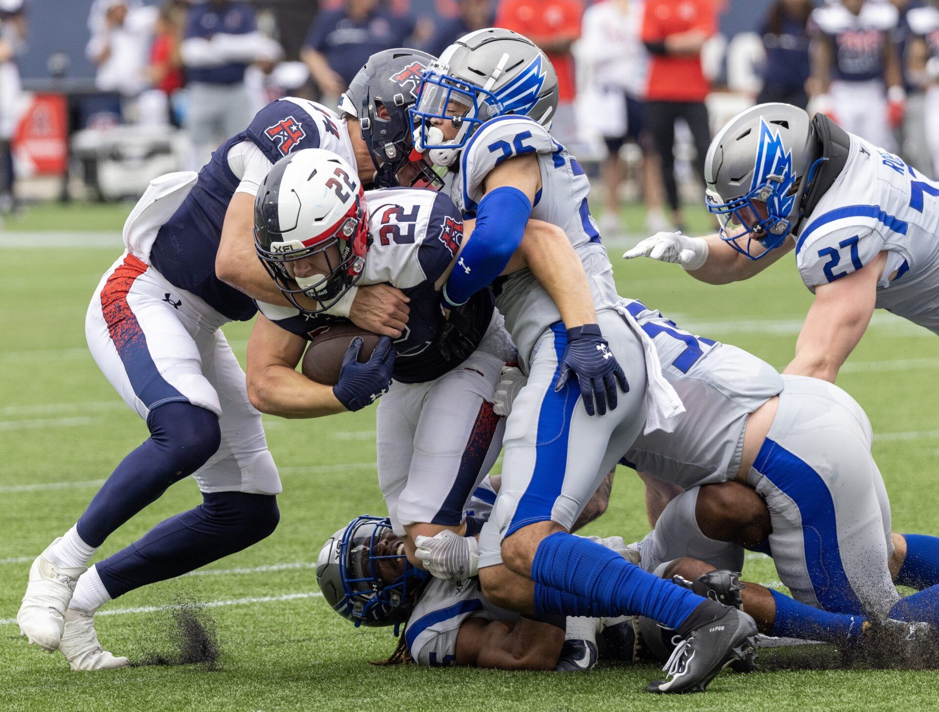 Max Borghi is tackled by St. Louis Battlehawks safety Lukas Denis.