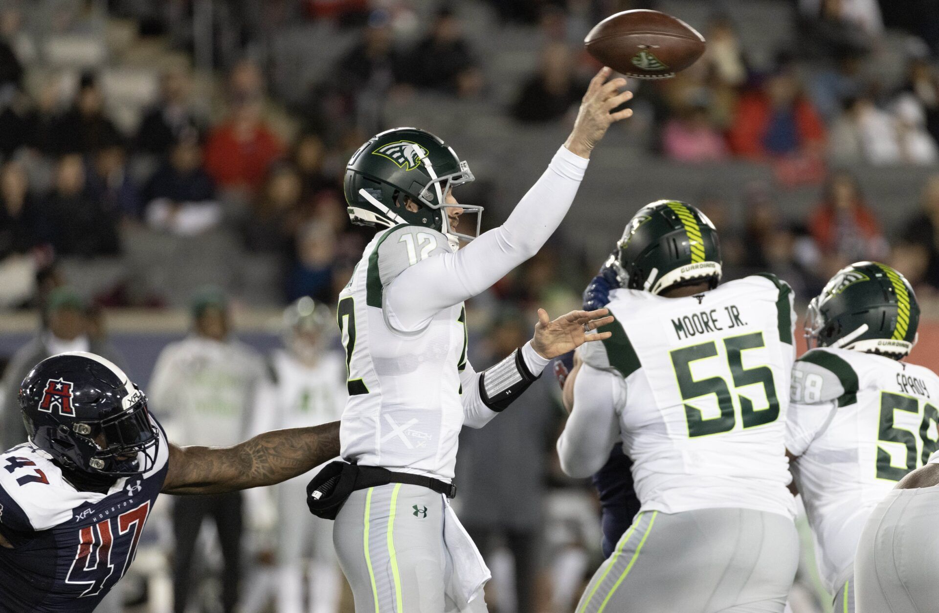Quinten Dormady throws a pass against Houston Roughnecks linebacker Chaucey Rivers.