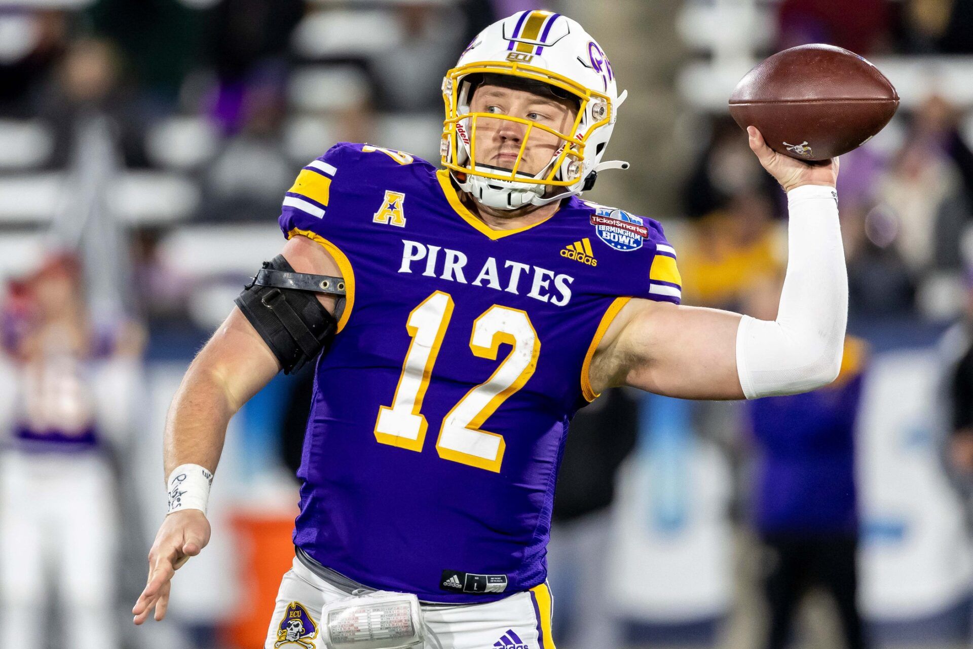 East Carolina QB Holton Ahlers (12) throws a pass against Coastal Carolina.