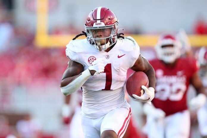 Jahmyr Gibbs rushes for a touchdown in the fourth quarter against the Arkansas Razorbacks.