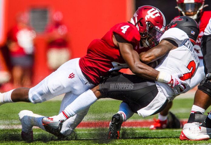 Cam Jones tackles Davion Ervin-Poindexter during the Indiana vs. Western Kentucky game.