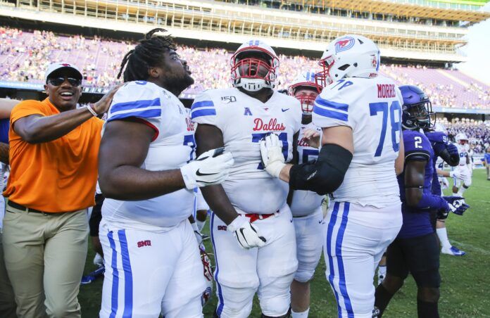 SMU guard Jaylon Thomas (71) celebrates with teammates after a victory.