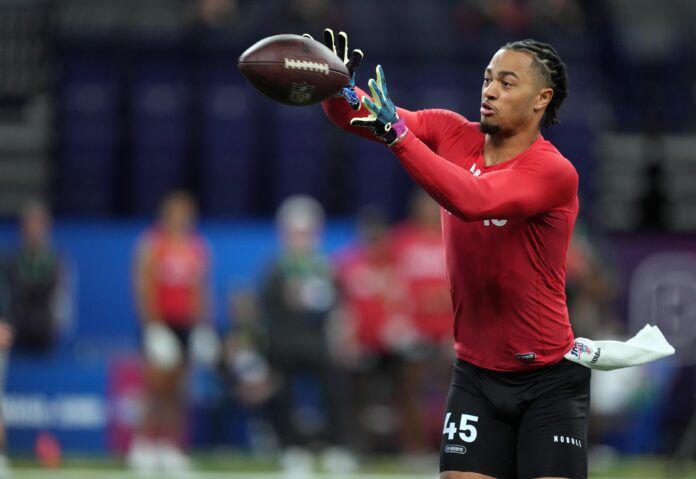 Ohio State WR Jaxon Smith-Njigba participates in drills at Lucas Oil Stadium.