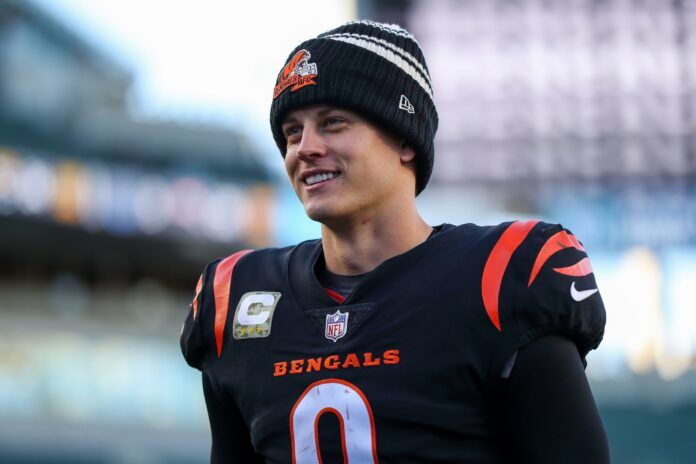 Cincinnati Bengals quarterback Joe Burrow (9) walks off the field after the victory over the Carolina Panthers.