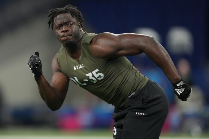 Thomas Incoom participates in drills during the NFL combine at Lucas Oil Stadium.