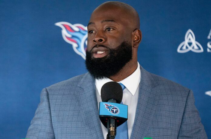 Tennessee Titans GM Ran Carthon answers questions at a news conference.