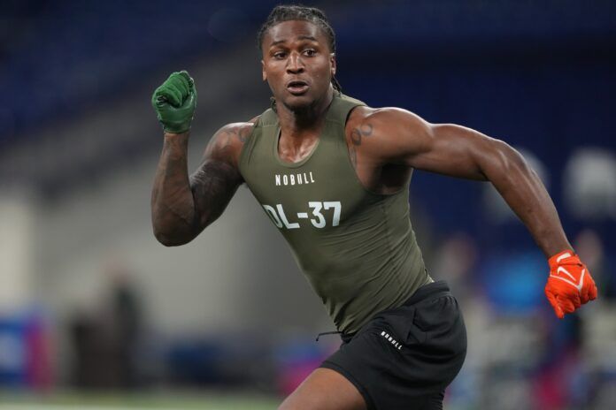 Isaiah Land participates in drills during the NFL combine at Lucas Oil Stadium.