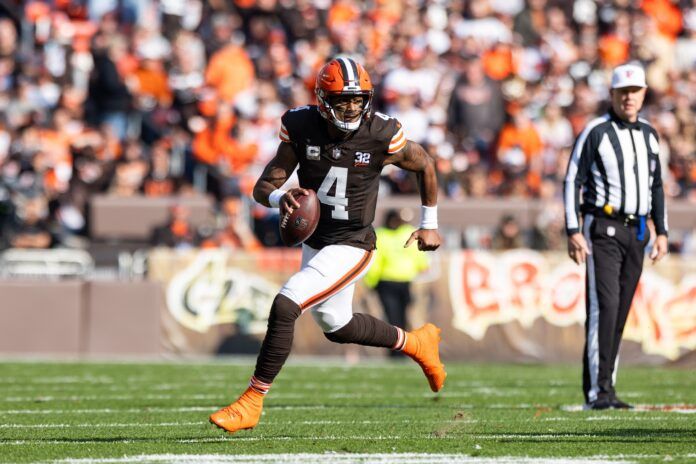 Cleveland Browns quarterback Deshaun Watson (4) runs the ball against the against the Arizona Cardinals during the second quarter at Cleveland Browns Stadium. Watson is the highest-paid NFL player for the 2024 season. Mandatory Credit: Scott Galvin-USA TODAY Sports