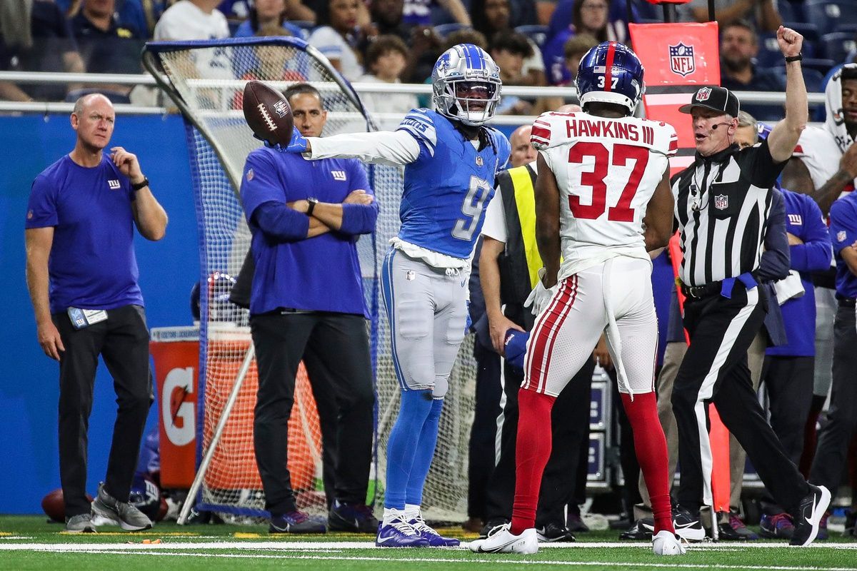 Detroit Lions WR Jameson Williams (9) reacts after a first down against the New York Giants.