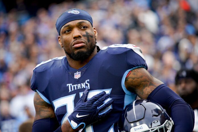 Derrick Henry (22) listens to the National Anthem before facing the Jacksonville Jaguars at Nissan Stadium.