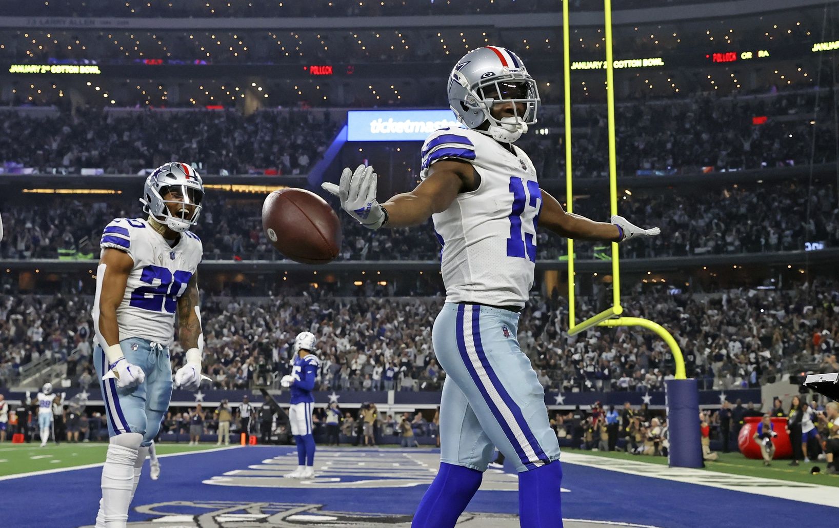 Michael Gallup (13) reacts after scoring a touchdown during the second quarter against the Indianapolis Colts.