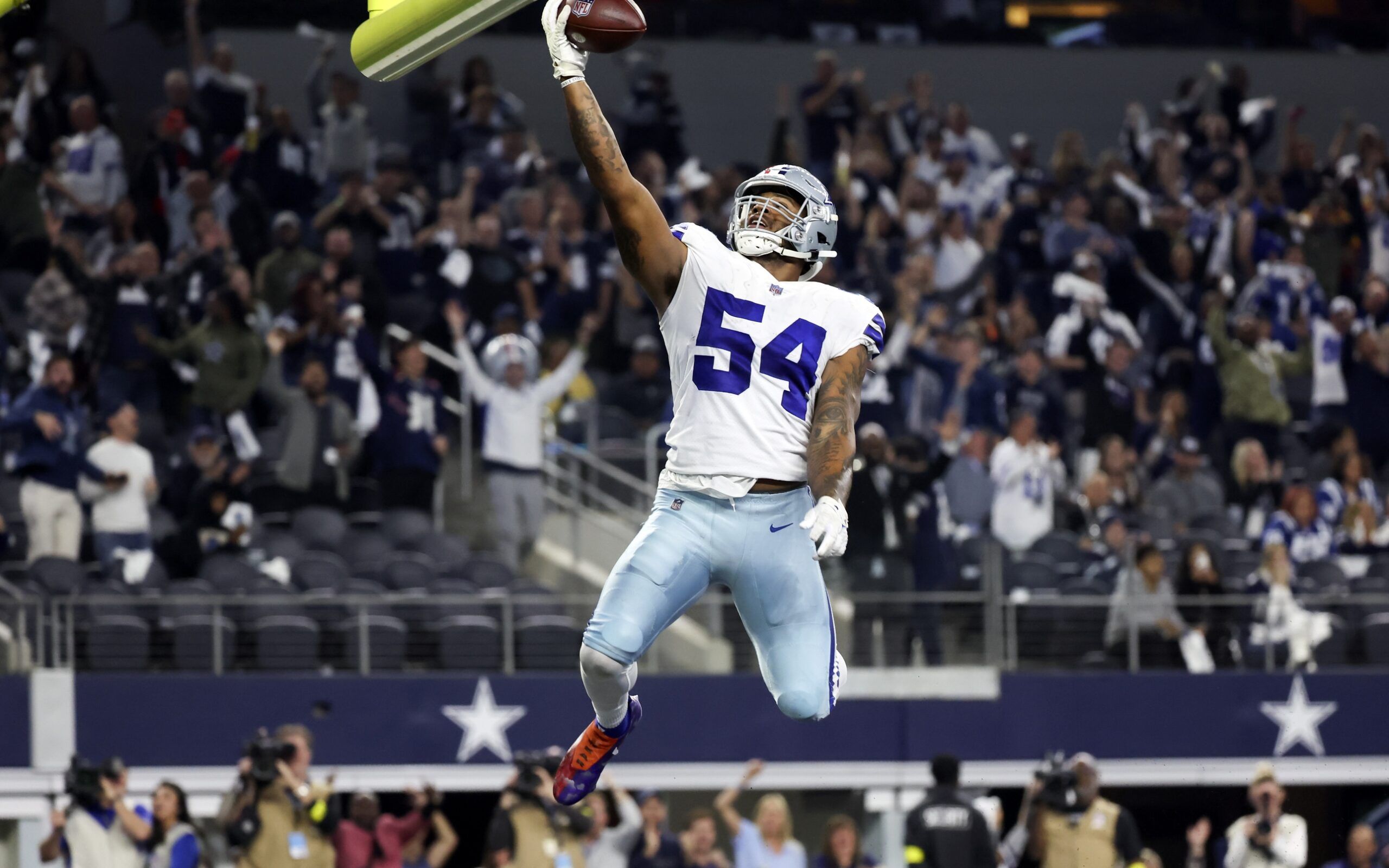 Sam Williams (54) celebrates after recovering a fumble during the second half against the Indianapolis Colts.