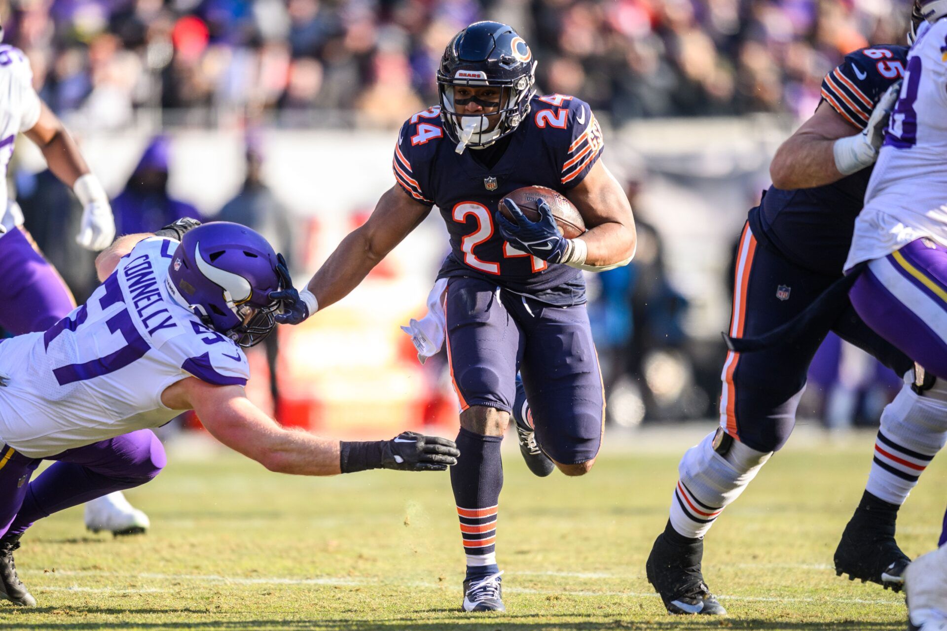 Khalil Herbert (24) runs the ball during the third quarter against the Minnesota Vikings at Soldier Field.