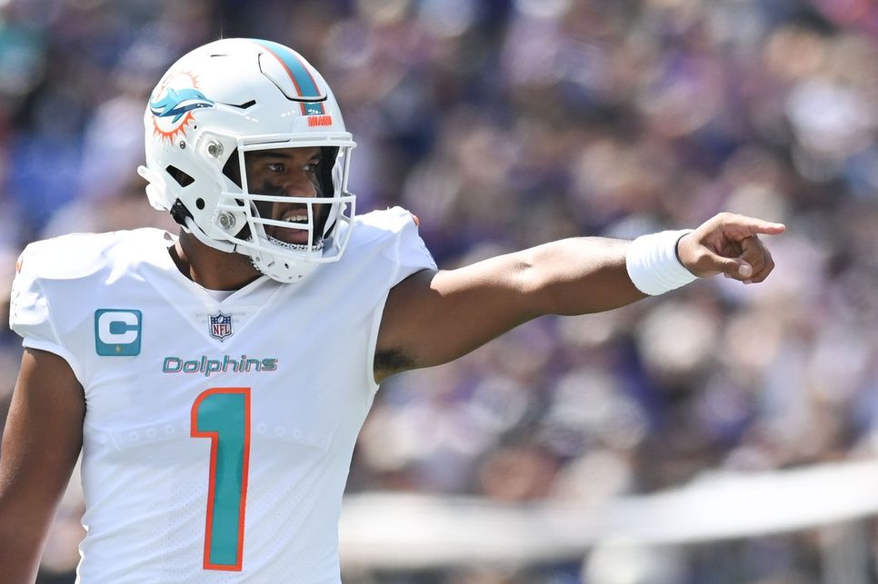 Tua Tagovailoa (1) calls a play at the line during the first half against the Baltimore Ravens.