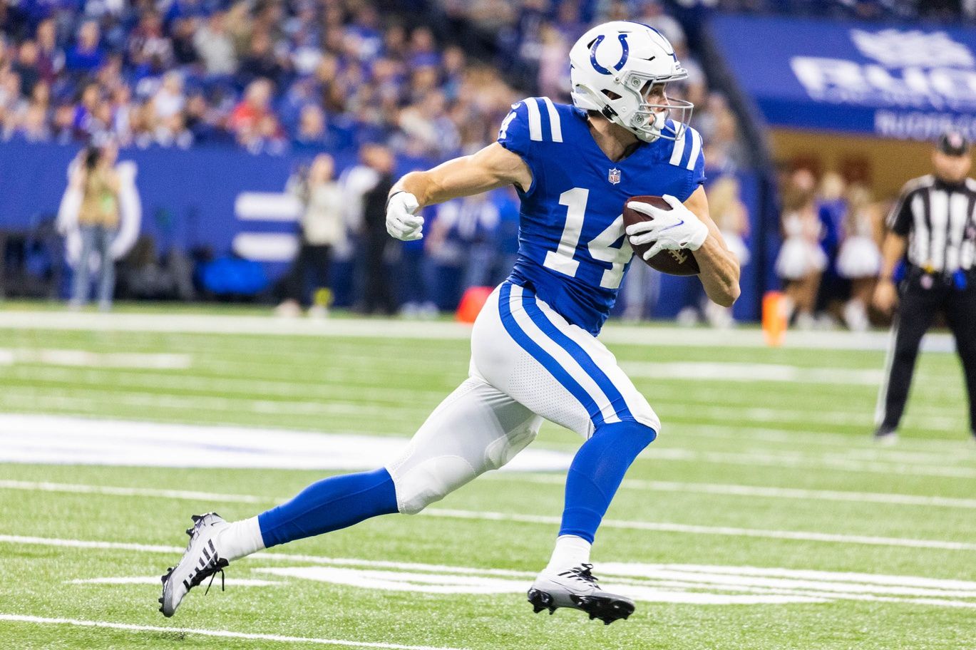 Alec Pierce (14) runs with the ball in the first quarter against the Houston Texans at Lucas Oil Stadium.