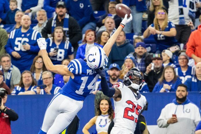 Alec Pierce (14) attempts to catch the ball while Houston Texans cornerback Desmond King II (25) defends in the first quarter at Lucas Oil Stadium.