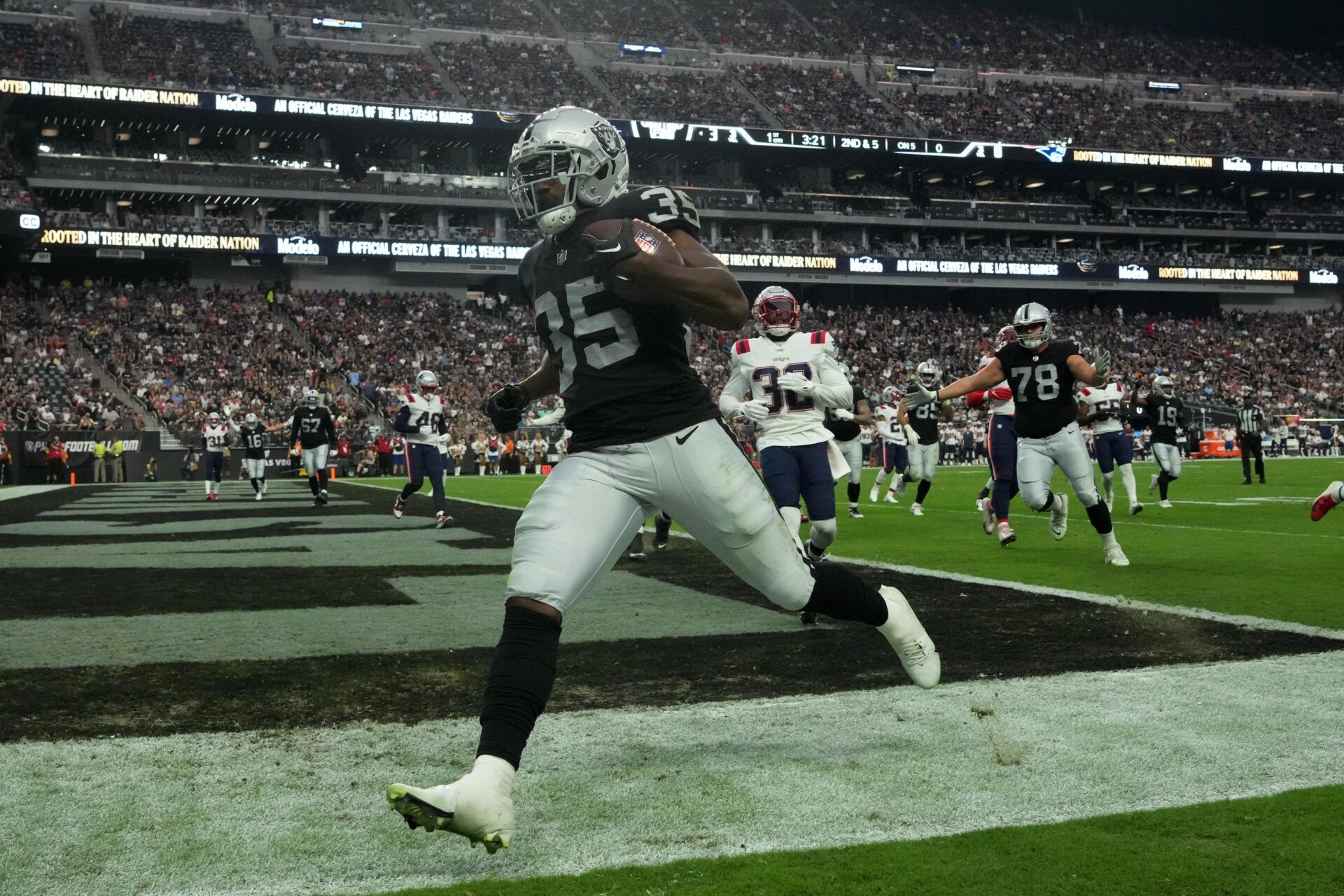 Zamir White (35) runs for a touchdown in the first half against the New England Patriots at Allegiant Stadium.