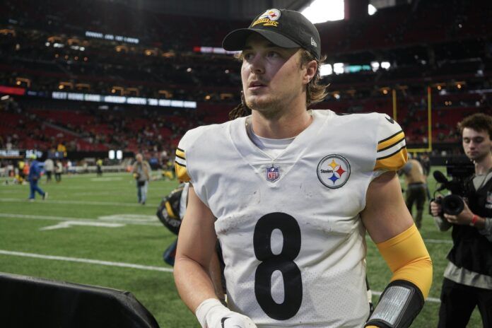 Pittsburgh Steelers quarterback Kenny Pickett (8) celebrates.