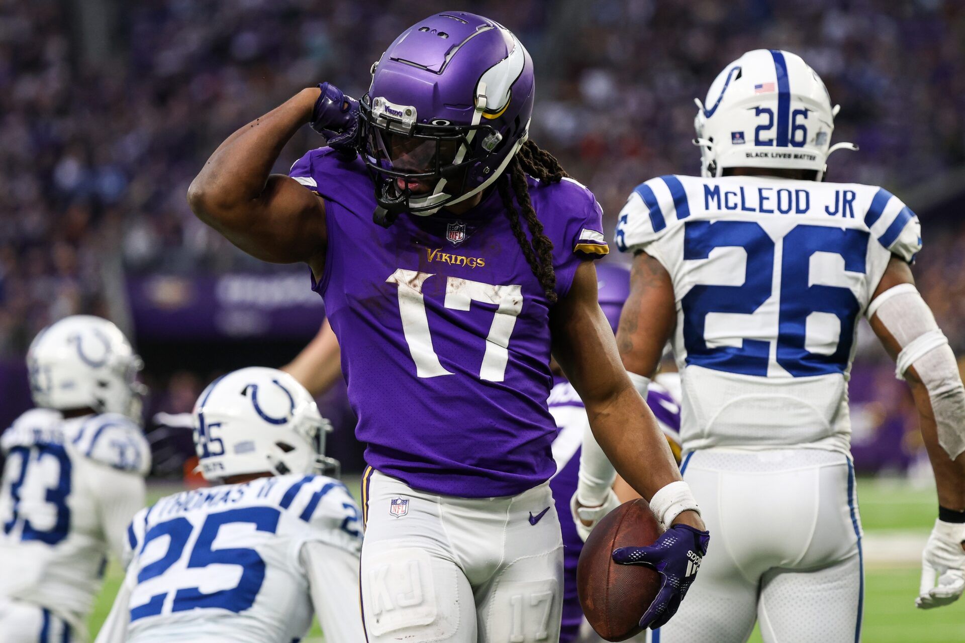 Minnesota Vikings WR K.J. Osborn (17) flexes after making a play against the Indianapolis Colts.
