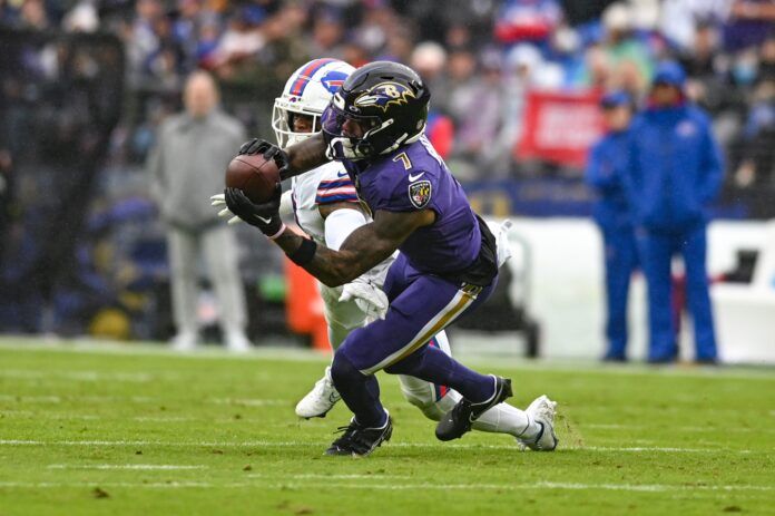 Rashod Bateman (7) catches a pass as Buffalo Bills safety Damar Hamlin (3) defends during the second quarter.