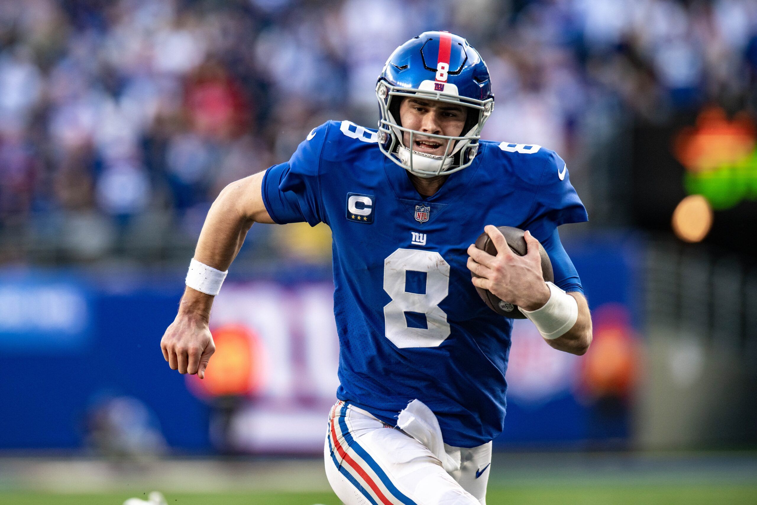 Daniel Jones (8) runs for a touchdown against the Indianapolis Colts during the second half at MetLife Stadium.