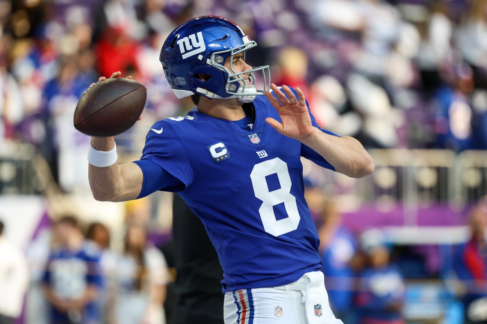 Daniel Jones (8) warms up before the game against the Minnesota Vikings at U.S. Bank Stadium.