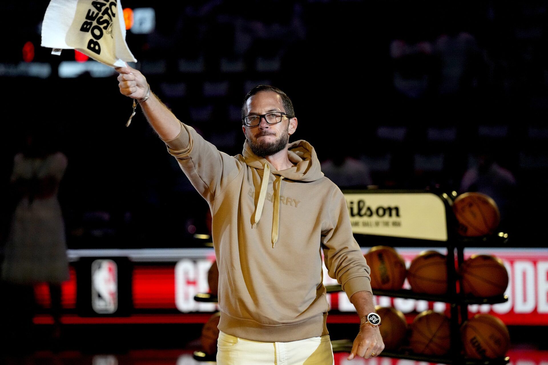 Miami Dolphins head coach Mike McDaniel at a Miami Heat basketball game