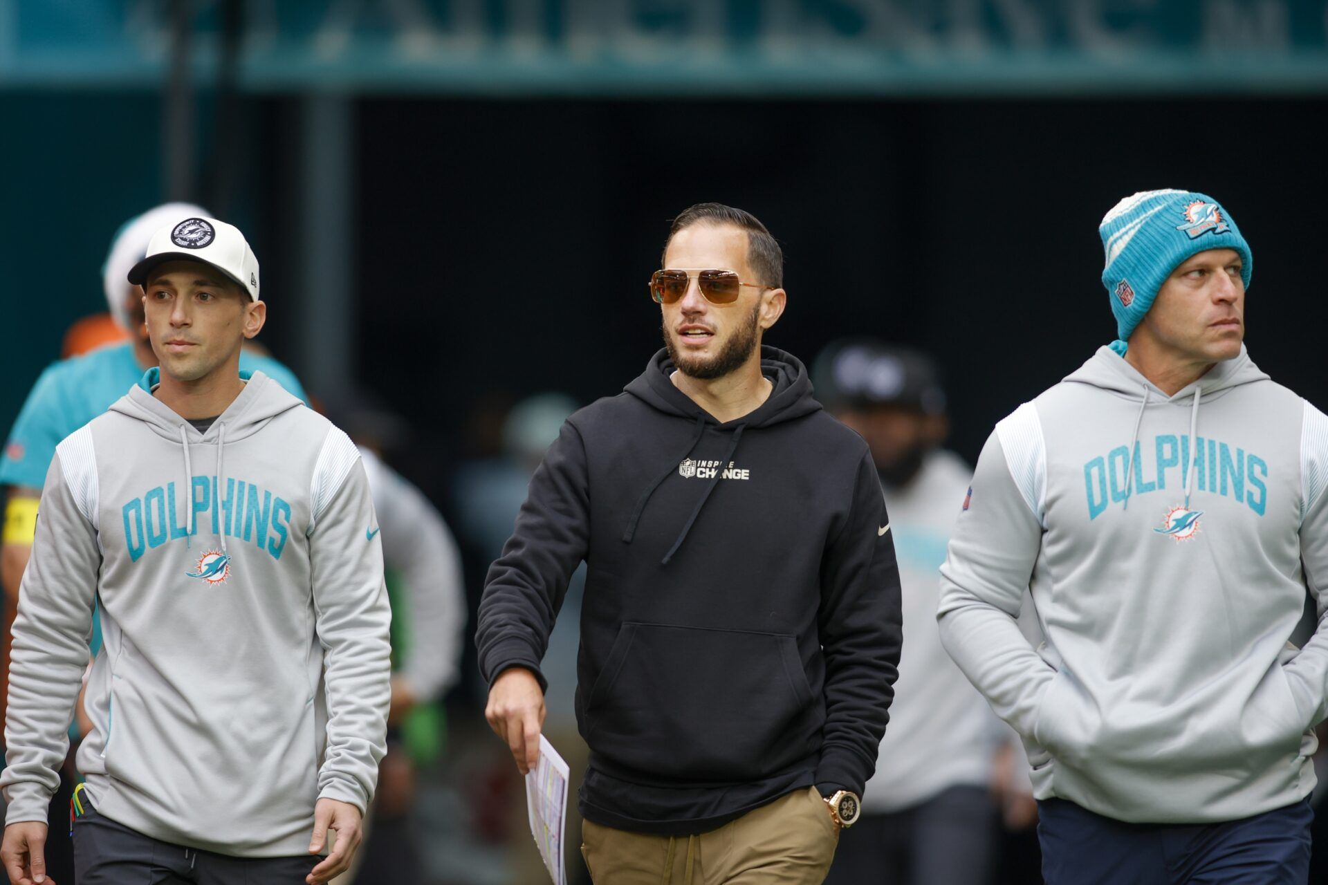 Mike McDaniel takes to the field prior to the game against the Green Bay Packers at Hard Rock Stadium.