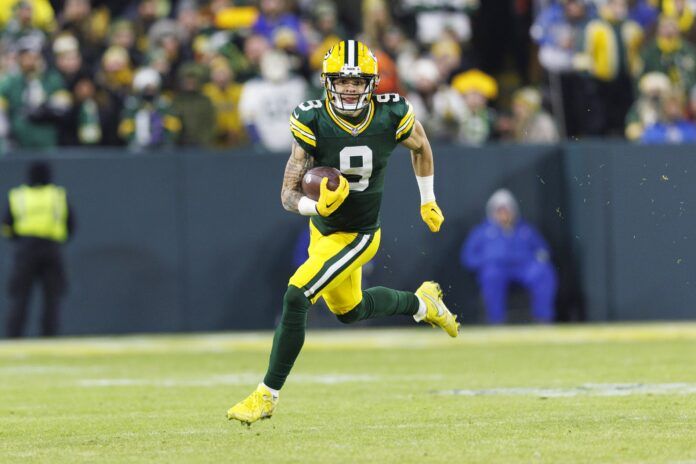 Green Bay Packers wide receiver Christian Watson (9) rushes with the football.