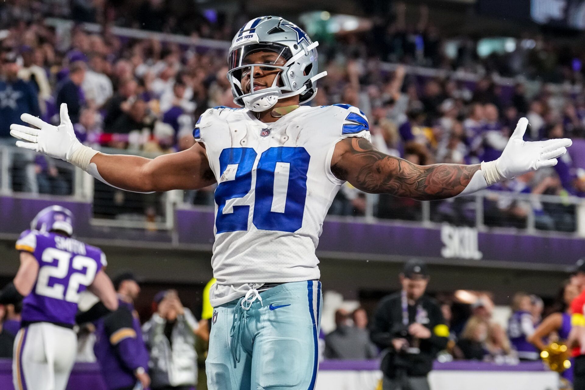 Tony Pollard (20) celebrates his touchdown during the third quarter against the Minnesota Vikings at U.S. Bank Stadium.