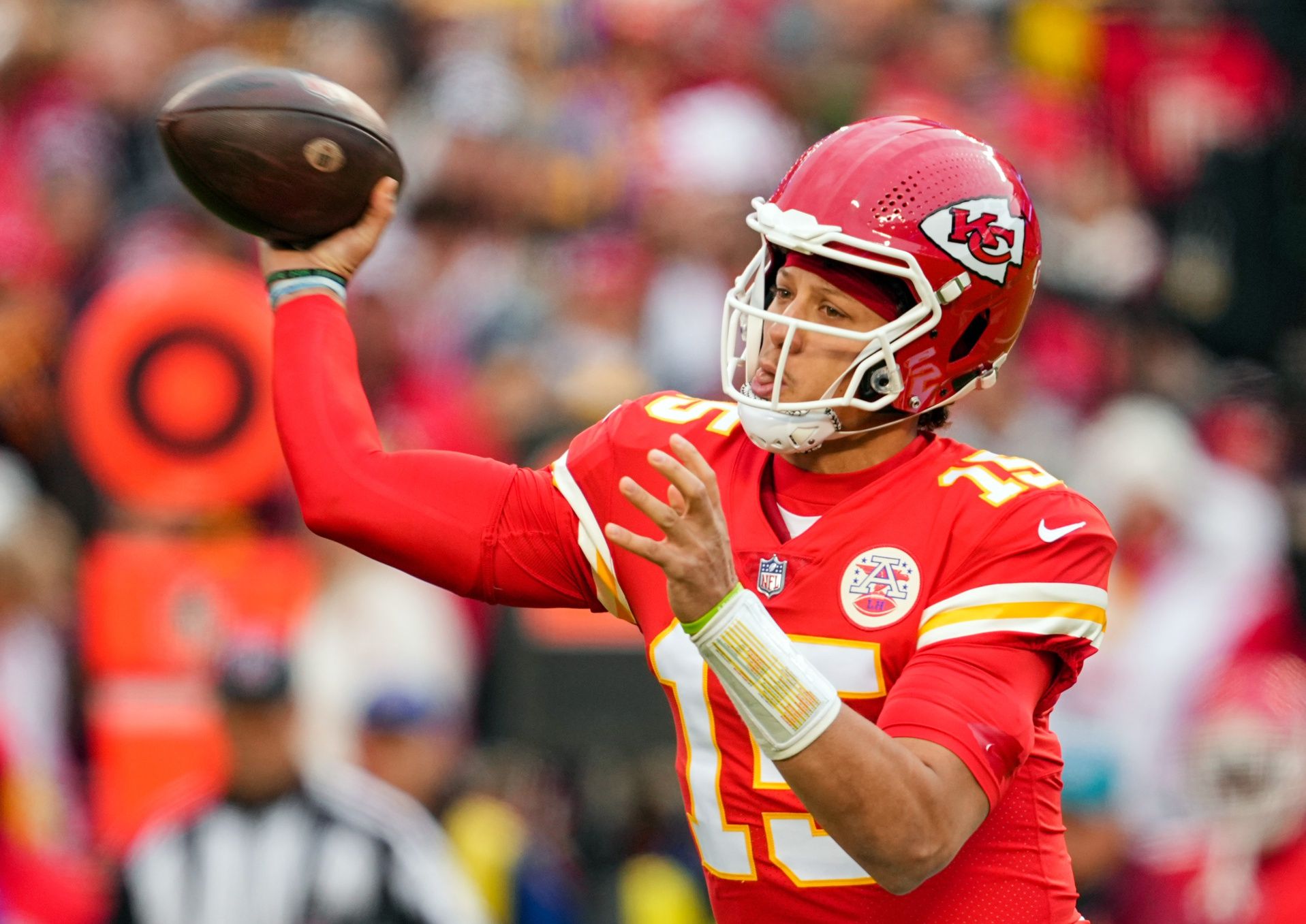 Patrick Mahomes (15) throws a pass during the first half against the Los Angeles Rams at GEHA Field at Arrowhead Stadium.